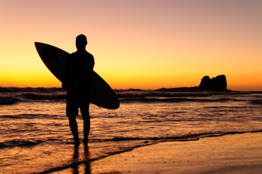 A surfer at Magnific Rock Nicaragua.